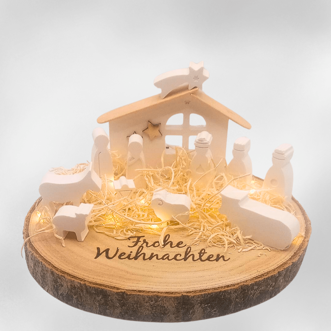Handgemachte Weihnachtskrippe aus Keraflott – Mini Krippenszene mit LED - Licht auf Baumscheibe - Zauberwerk